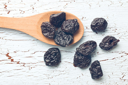 are dried prunes bad for dogs